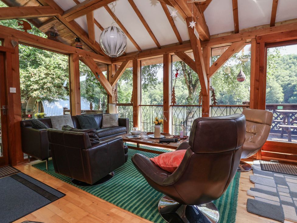 A conservatory with seating area at The Boat House Rudyard Lake