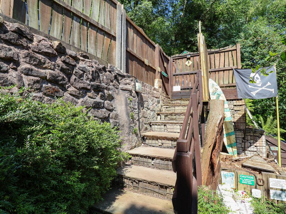 An outdoor area with steps leading to a fence at The Boat House Rudyard Lake