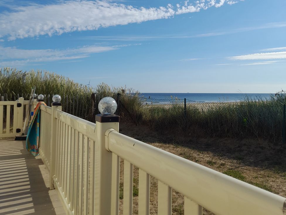 A view from a deck facing the ocean at Sands Retreat in Redcar