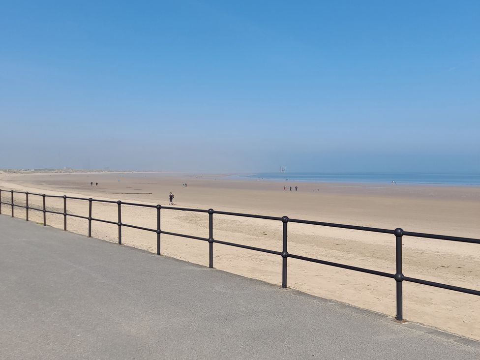 A beach with sand and water at Sands Retreat in Redcar