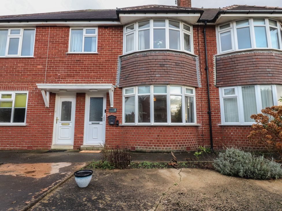 A front view of a house with windows and a door at Flat 6 Lytham St. Annes