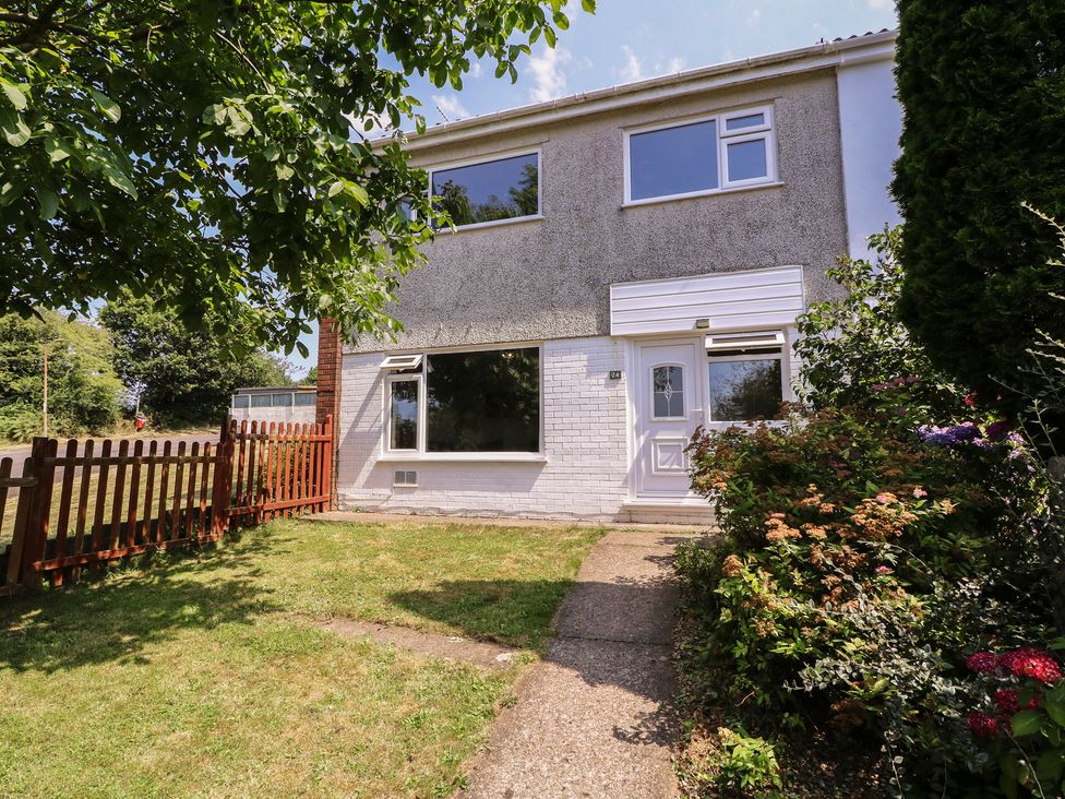 A house with a front door and windows at 24 Cefn Court Newport