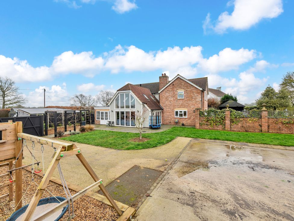 A house with garden and playground at Oldfields