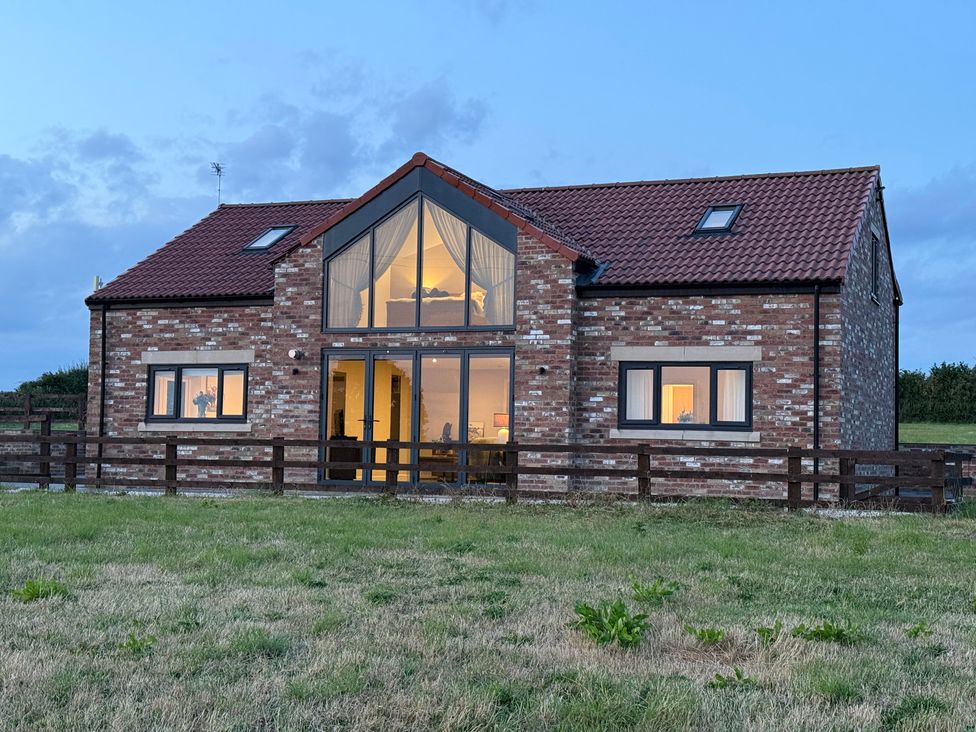 A house with a fence in front at Westholme Country Lodge Thirsk