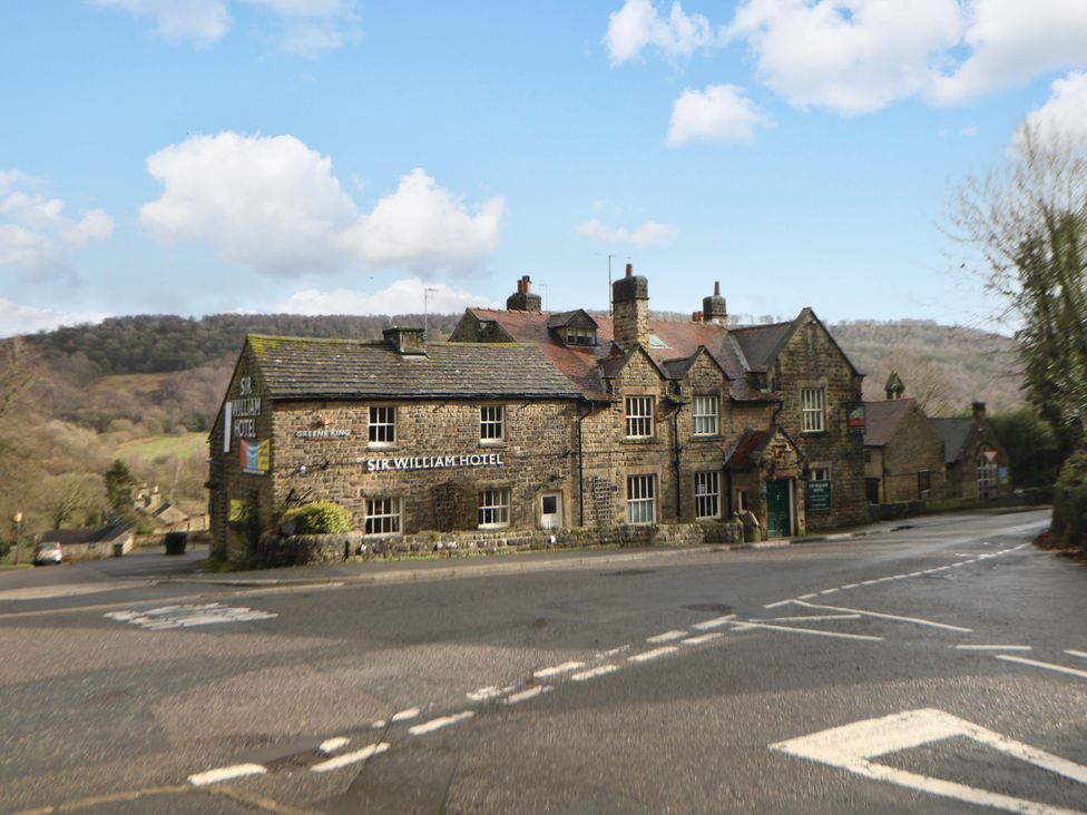 A hotel building on a street corner at The Reading Room in Hope Valley
