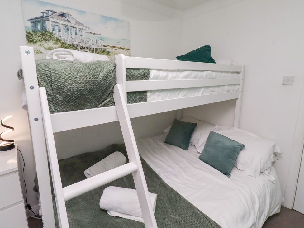 A bunk bed with a lower bed made at Harper's Hideaway near Felmoor Holiday Park near Felton