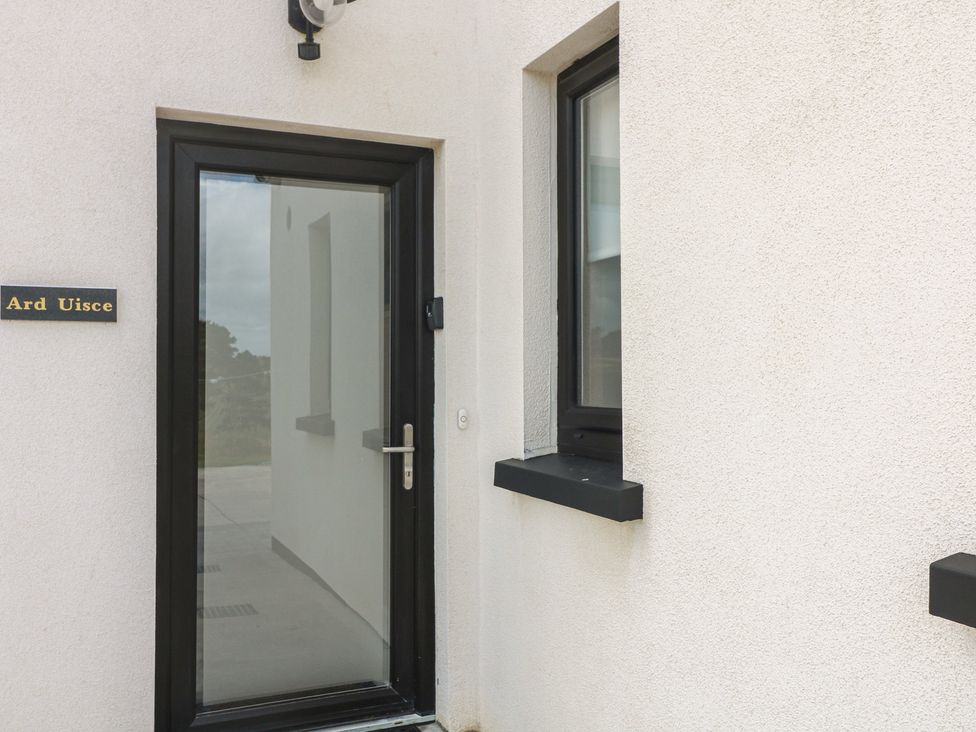 An entryway with a door and window at Ard Uisce @ Estuary Bliss Duncannon, County Wexford