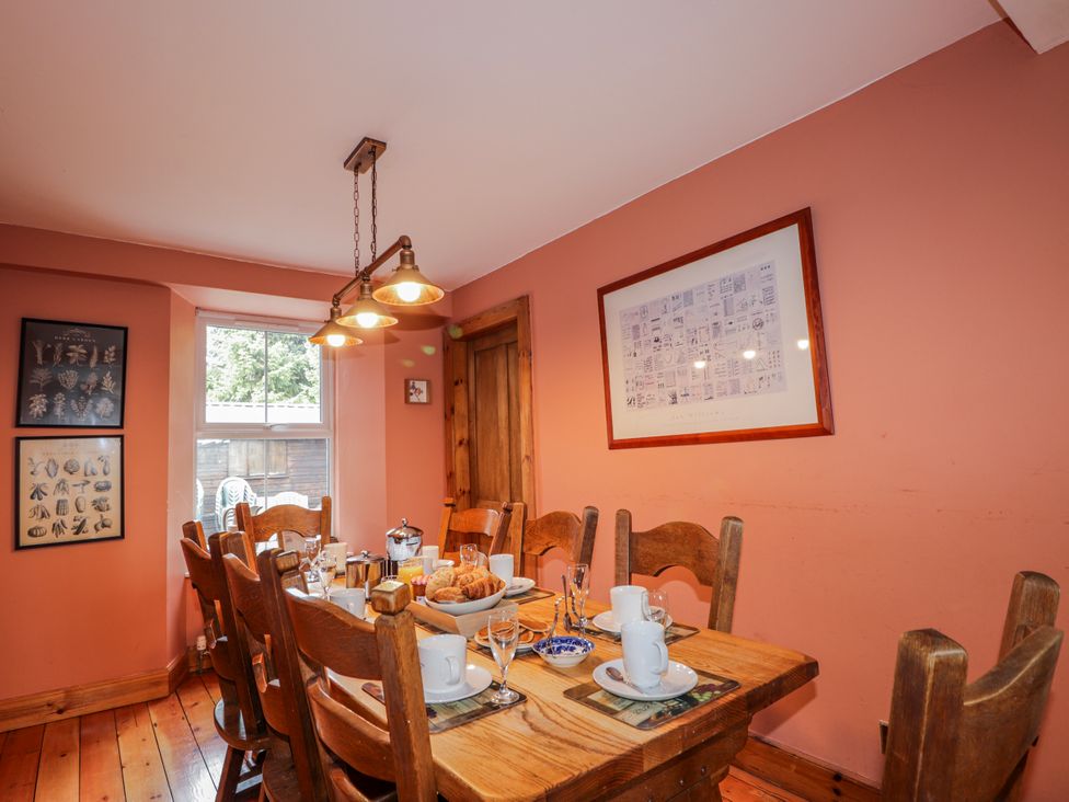A dining room with a table set for breakfast at Achnagonlin House in Grantown-on-Spey