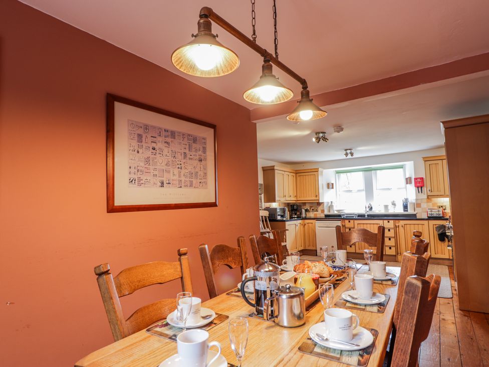 A dining room with a table set for breakfast at Achnagonlin House Grantown-on-Spey