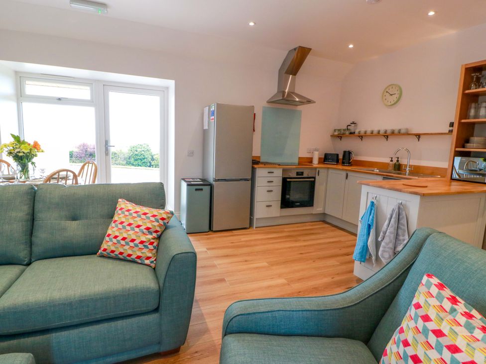 A kitchen with a fridge and oven at Burnside Bothy near Girvan