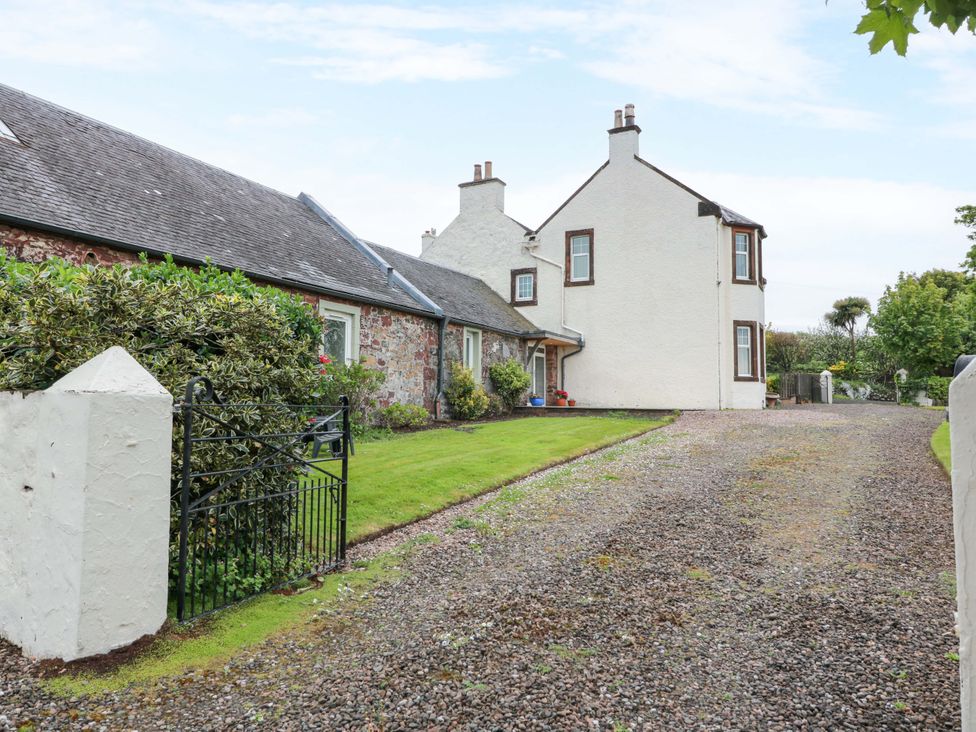 A house with a garden and driveway at Burnside Bothy near Girvan