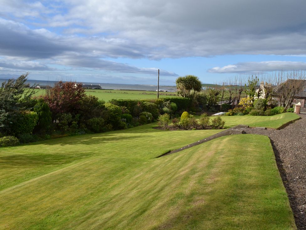 A garden with a view of the sea at Burnside Bothy Burnside Farm near Girvan