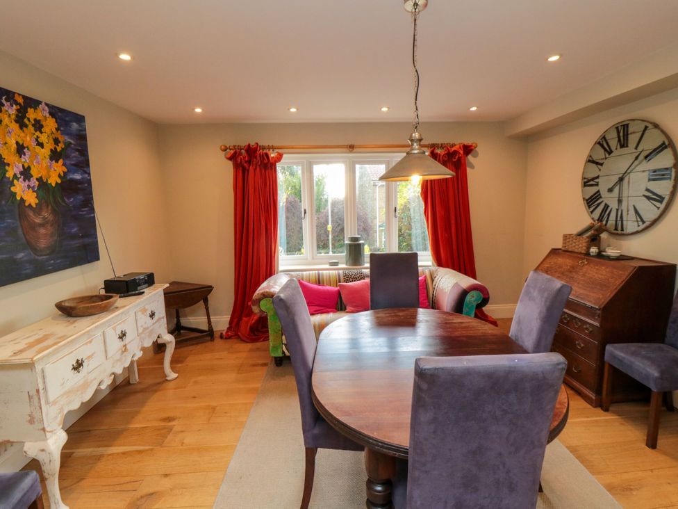 A dining room with a table and chairs at St. Anthonys in York