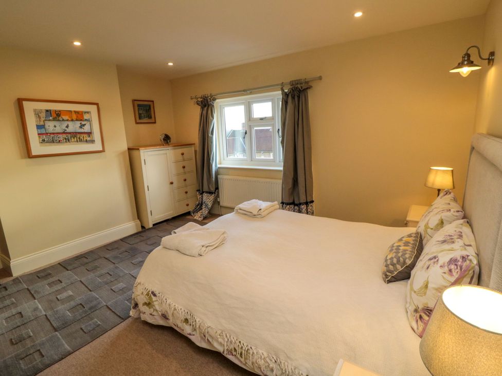 A bedroom with a bed and window at St. Anthonys in York