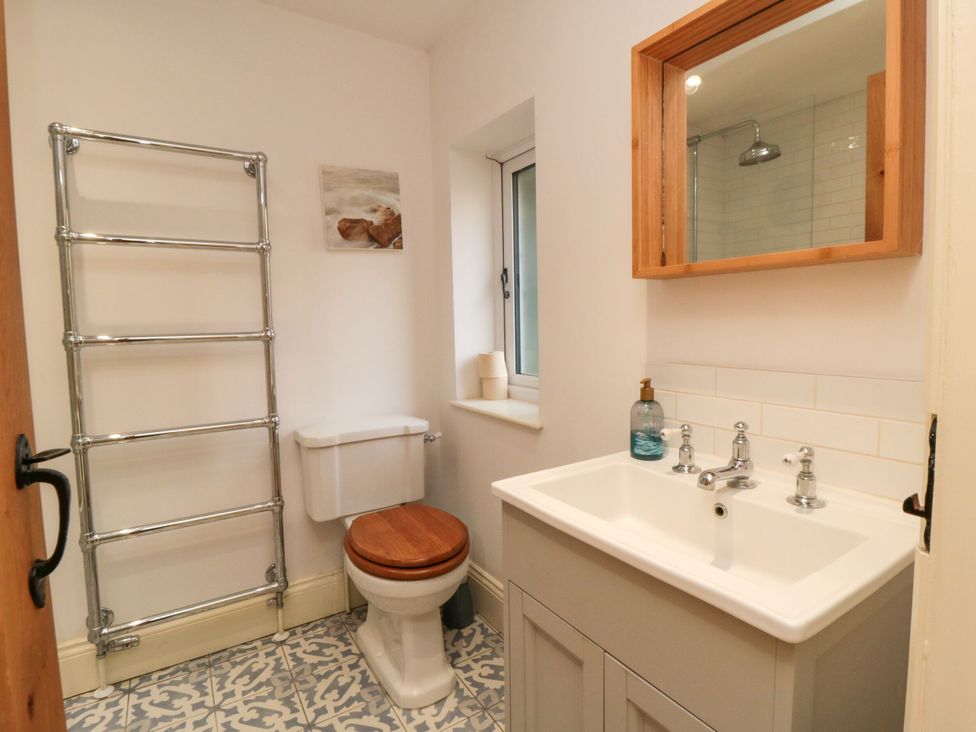 A bathroom with a sink and toilet at St. Anthonys in York