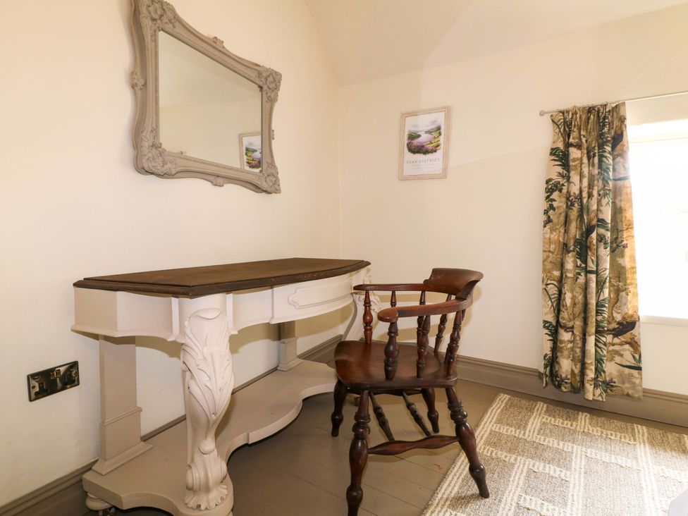 An office with a desk and chair at Hope Cottage in Great Longstone