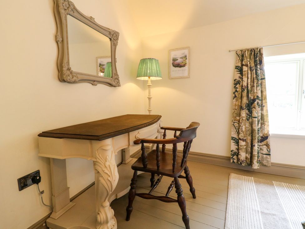 An office with a desk and chair at Hope Cottage in Great Longstone