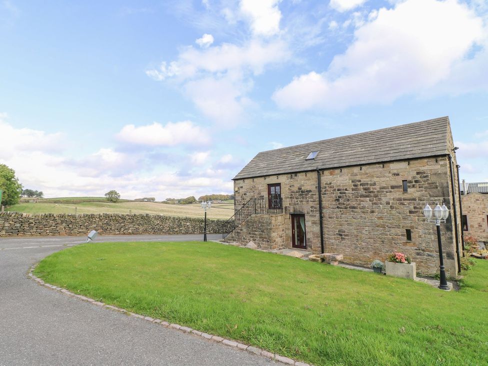 A barn with steps and a lamp post at Riber View Barn Chesterfield