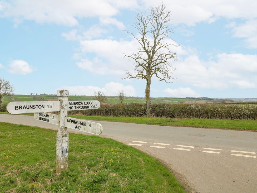 A signpost indicating directions to Braunston and America Lodge near Oakham