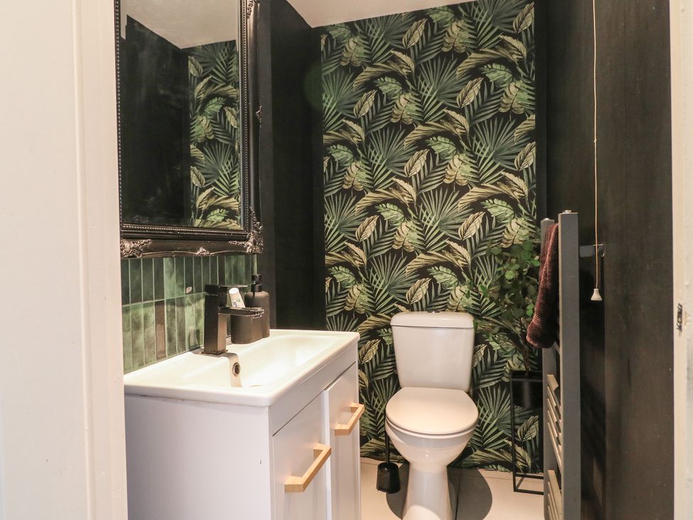 A bathroom with a sink and toilet at 57 Howden Avenue Doncaster