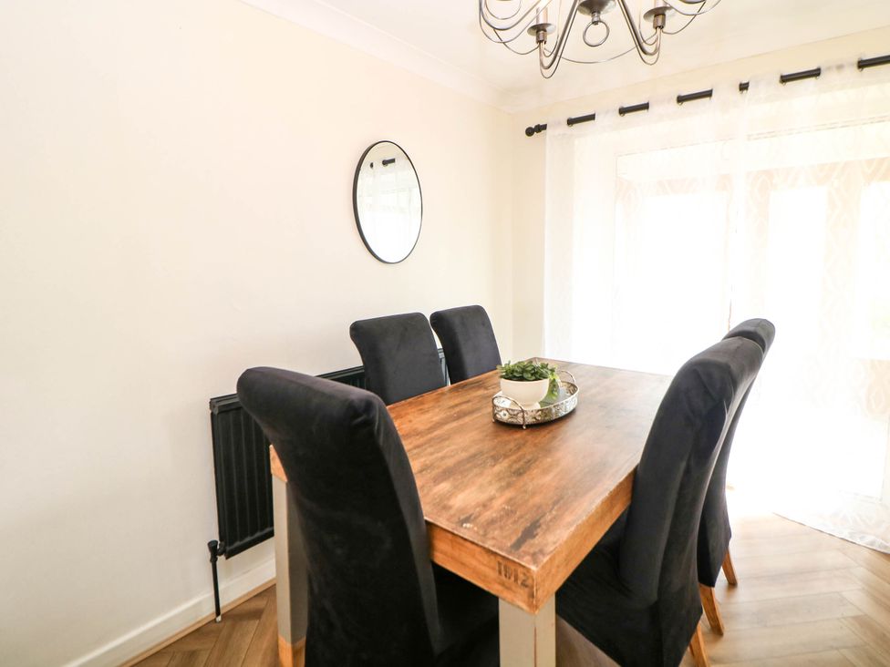 A dining room with a table and chairs at 57 Howden Avenue Skellow