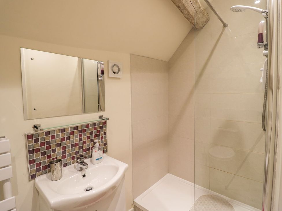 A bathroom with a sink and shower at The Bolt Hole in Stratford-upon-Avon