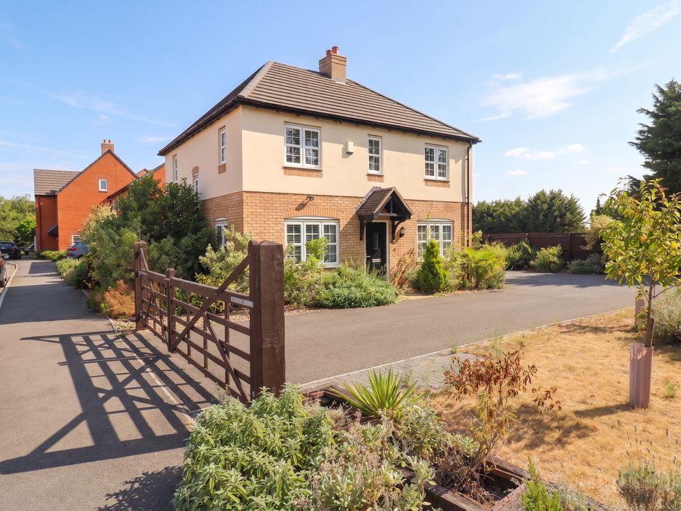 A house with a gate and driveway at 2 Clarke Close in Cottenham