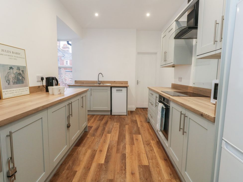 A kitchen with countertops and appliances at 93 Abbotsbury Road in Weymouth