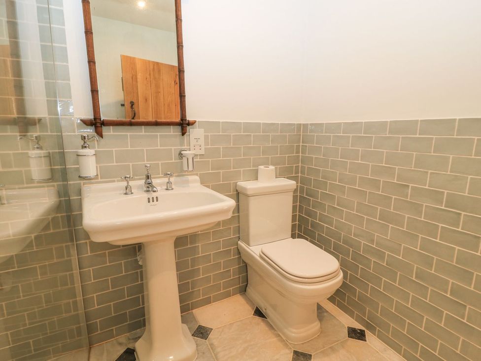 A bathroom with a sink and toilet at The Forge Broadway near Stow-On-The-Wold