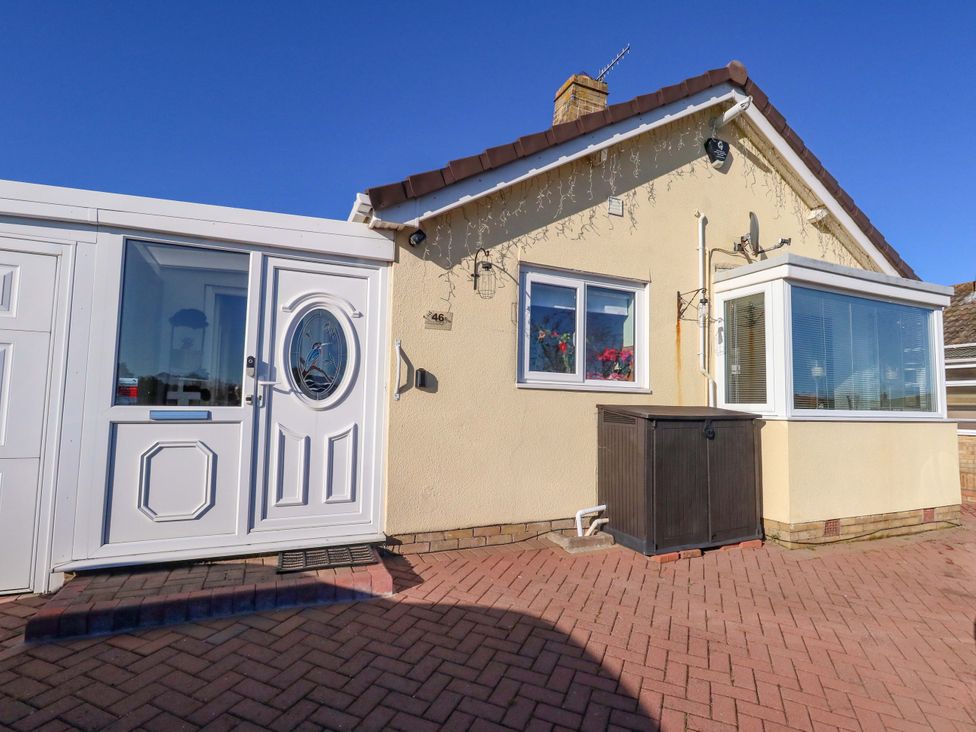 An exterior of a property showcasing a door and windows at 46 Chafeys Avenue