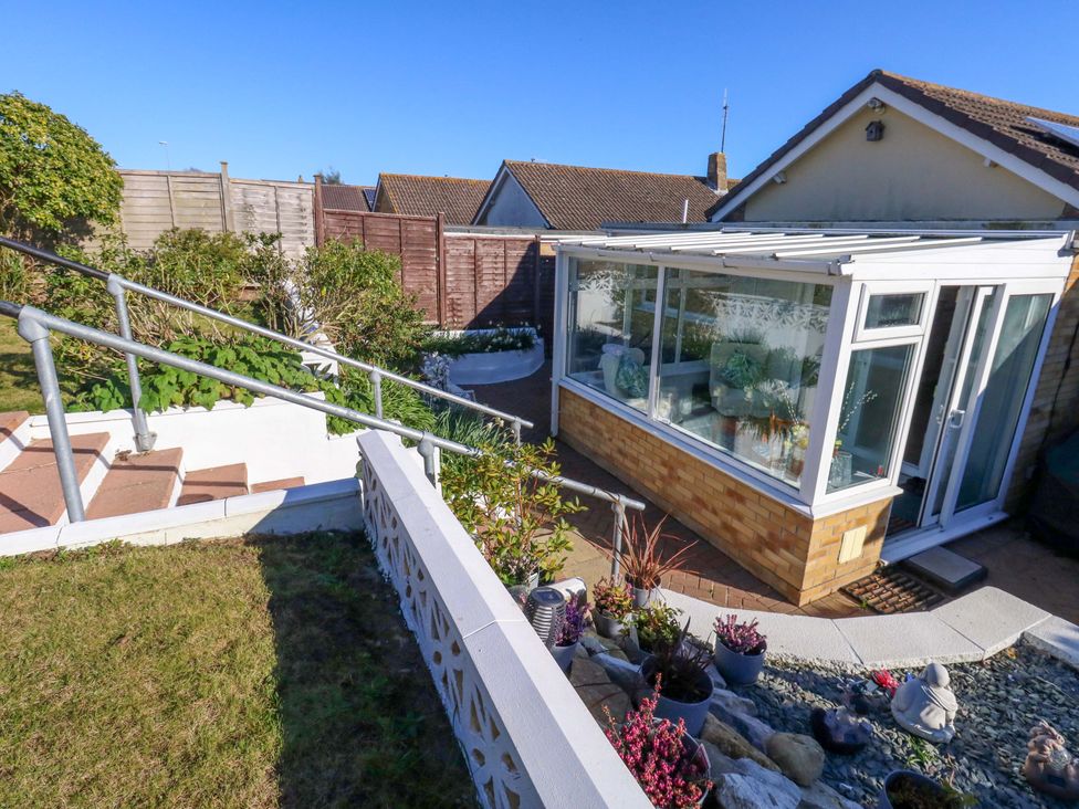 A conservatory with garden features at 46 Chafeys Avenue
