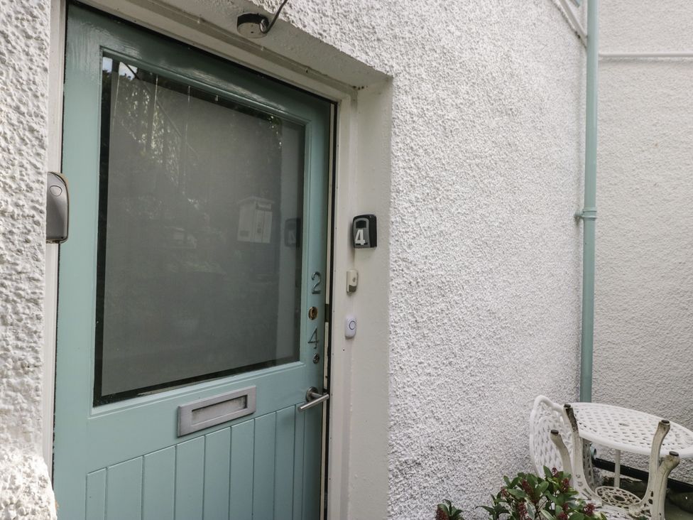 An exterior view showing a door with numbers at Flat 4 Tower House in Grange-Over-Sands