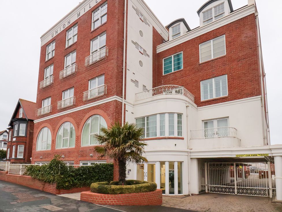 An apartment building with a car park entrance at One Union Mill in Whitby
