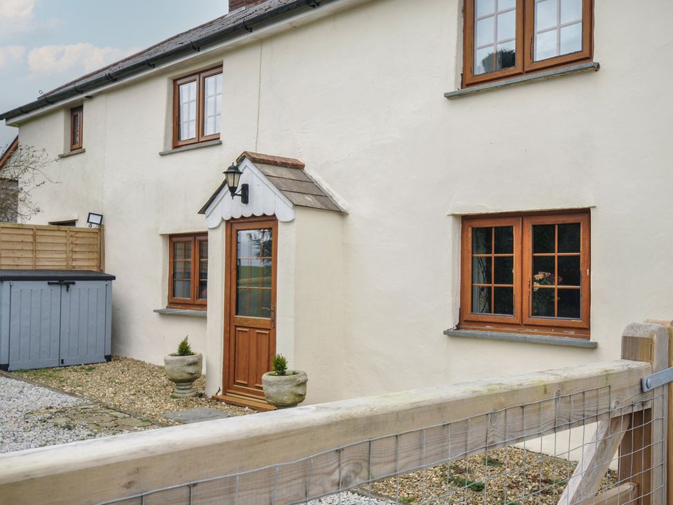 An outdoor view of a cottage entrance at Little Blagdon in Ashwater