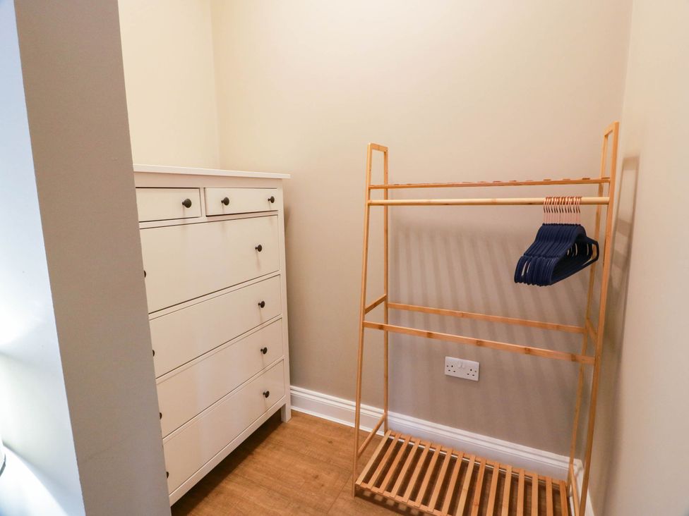 A closet with a dresser and a clothes rack at Flat 1 86 Gallowgate Street Largs