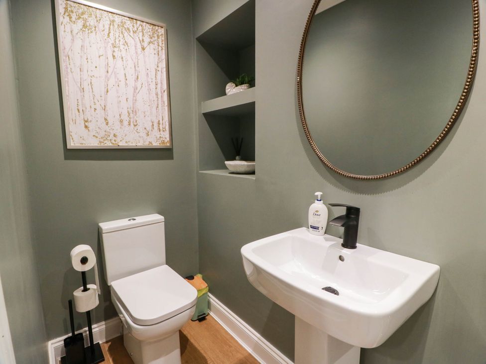A bathroom with a toilet and sink at Flat 1 86 Gallowgate Street Largs