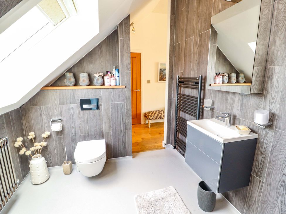 A bathroom with a sink and toilet at Lakes View in Keswick