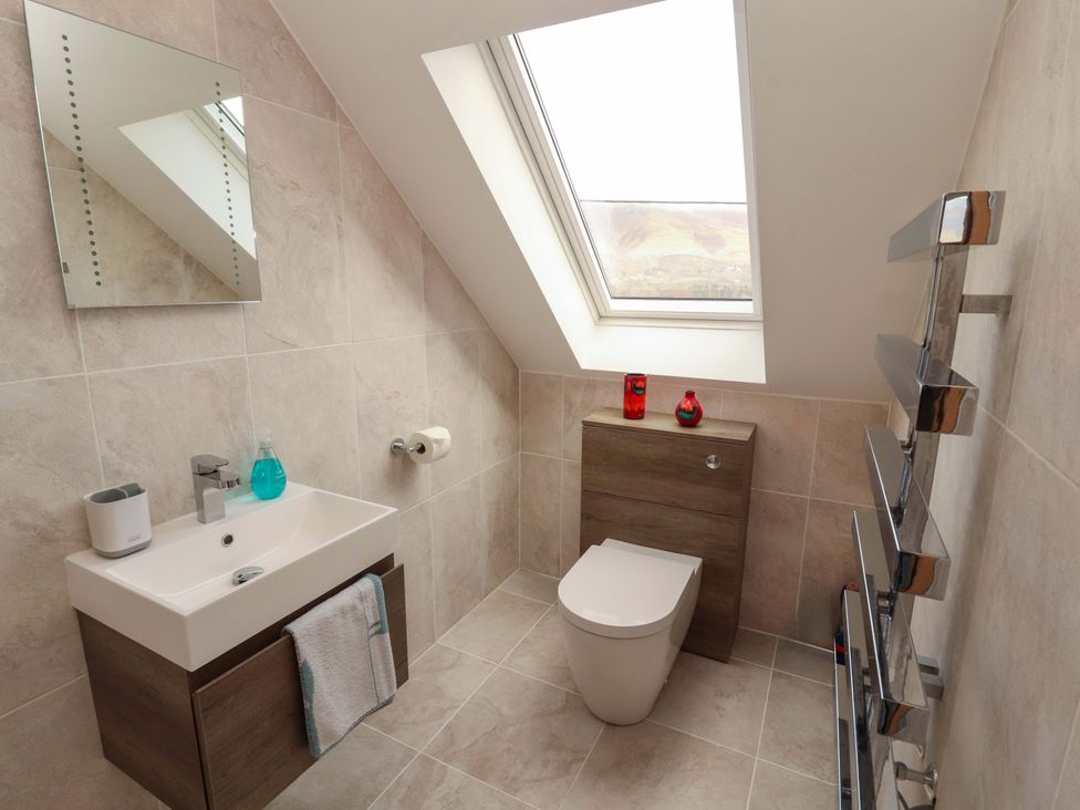 A bathroom with a sink and toilet at Lakes View in Keswick
