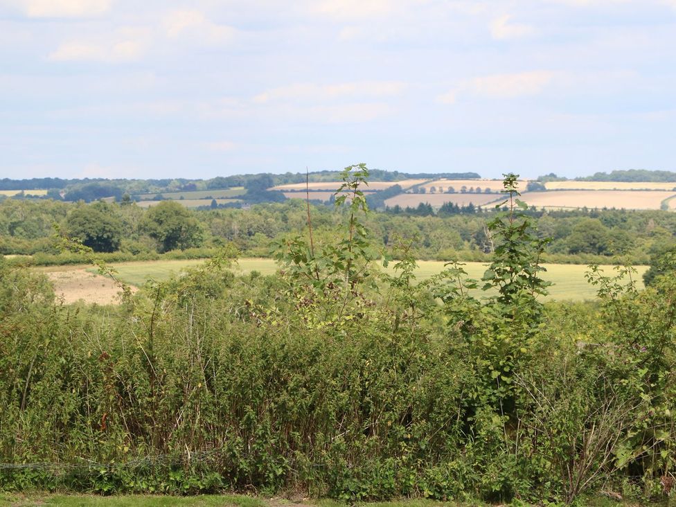 A view of fields and trees at Gardeners Cottage in Chipping Norton