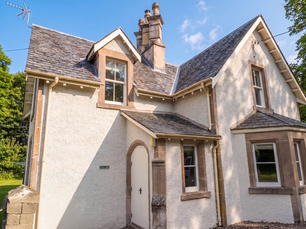 A house with a roof and windows at Station Lodge near Forres
