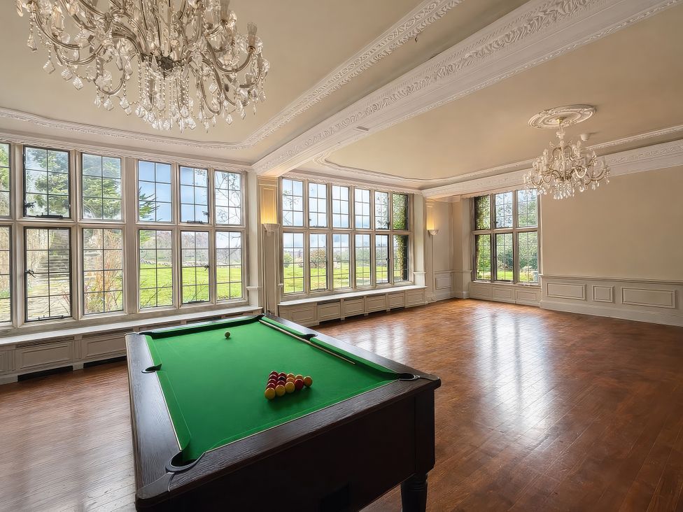A game room with a pool table at Hanlith Hall near Malham