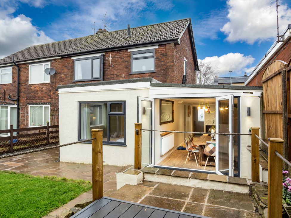 A house exterior with a garden view at Thieveley Pike View in Burnley