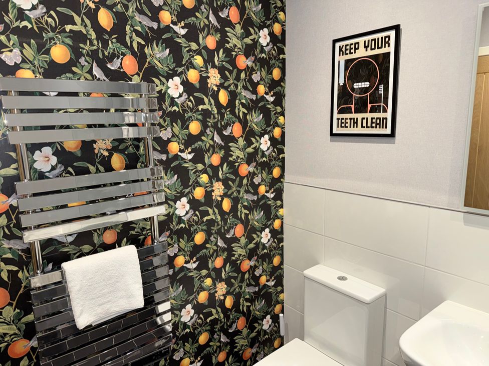 A bathroom featuring a towel rail and a toilet at Amber Rose Berwick-upon-Tweed