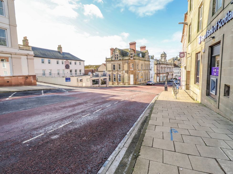A street view with buildings and a bank at Amber Rose Berwick-Upon-Tweed
