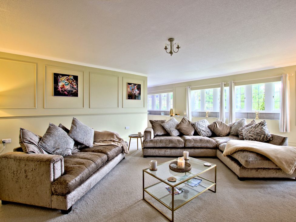 A living room featuring a sofa and coffee table at River View Cottage Hanlith near Malham