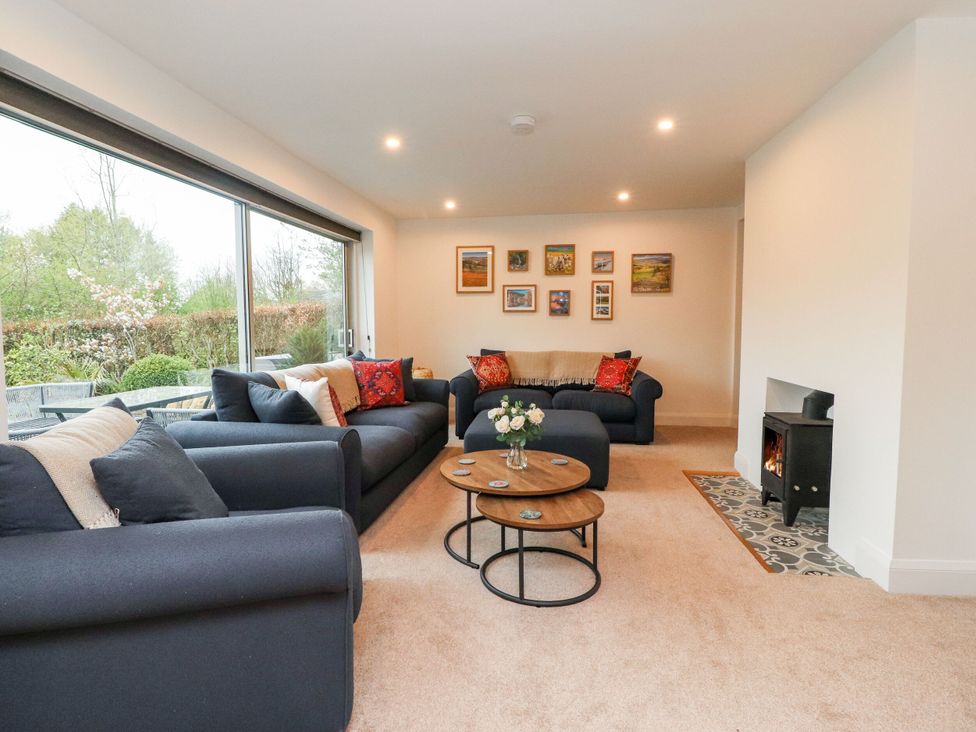 A living room with sofas and a coffee table at 2 The Croft in Skipton