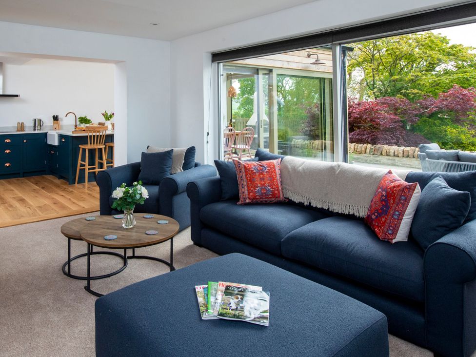 A living room featuring a couch and a coffee table at 2 The Croft in Skipton
