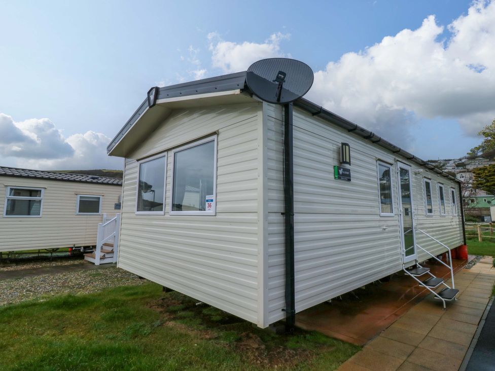 A mobile home with a satellite dish at Valley 36 in Kingsbridge