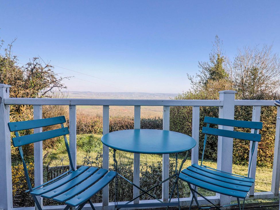 A table and chairs with a view at 2 Oak Tree Cottages Marshwood Nr. Hawkchurch