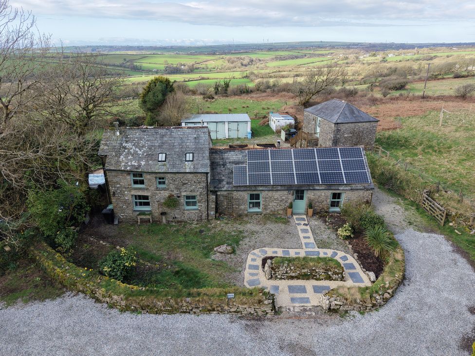 A house with solar panels and a garden at Tor Farm in Advent near Camelford